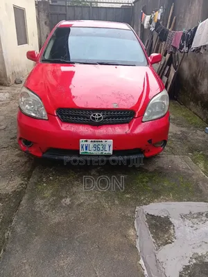 Toyota Matrix XR Hatchback FWD (1.8L 4cyl 4A) 2006 Red