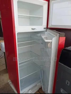 Double Door's Hisence Refrigerator With Water Dispenser.