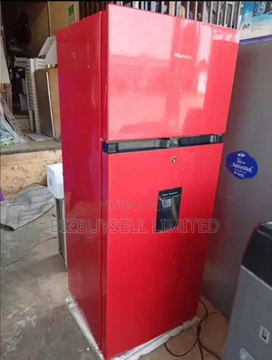 Double Door's Hisence Refrigerator With Water Dispenser.