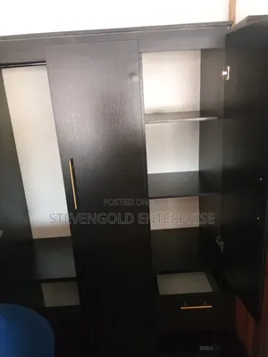 Modern Black Wardrobe | Spacious Storage & Elegant Gold Details