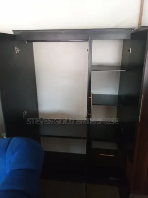 Modern Black Wardrobe | Spacious Storage & Elegant Gold Details