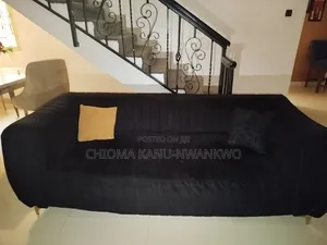 A 3 Seater Black Sofa