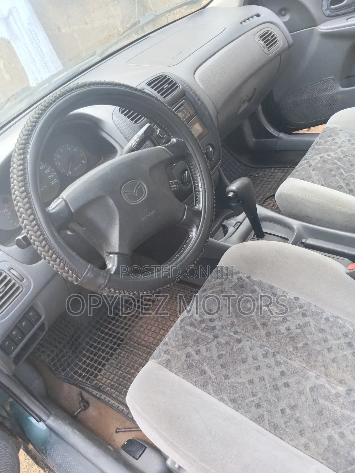 Mazda 323 2004 Green
