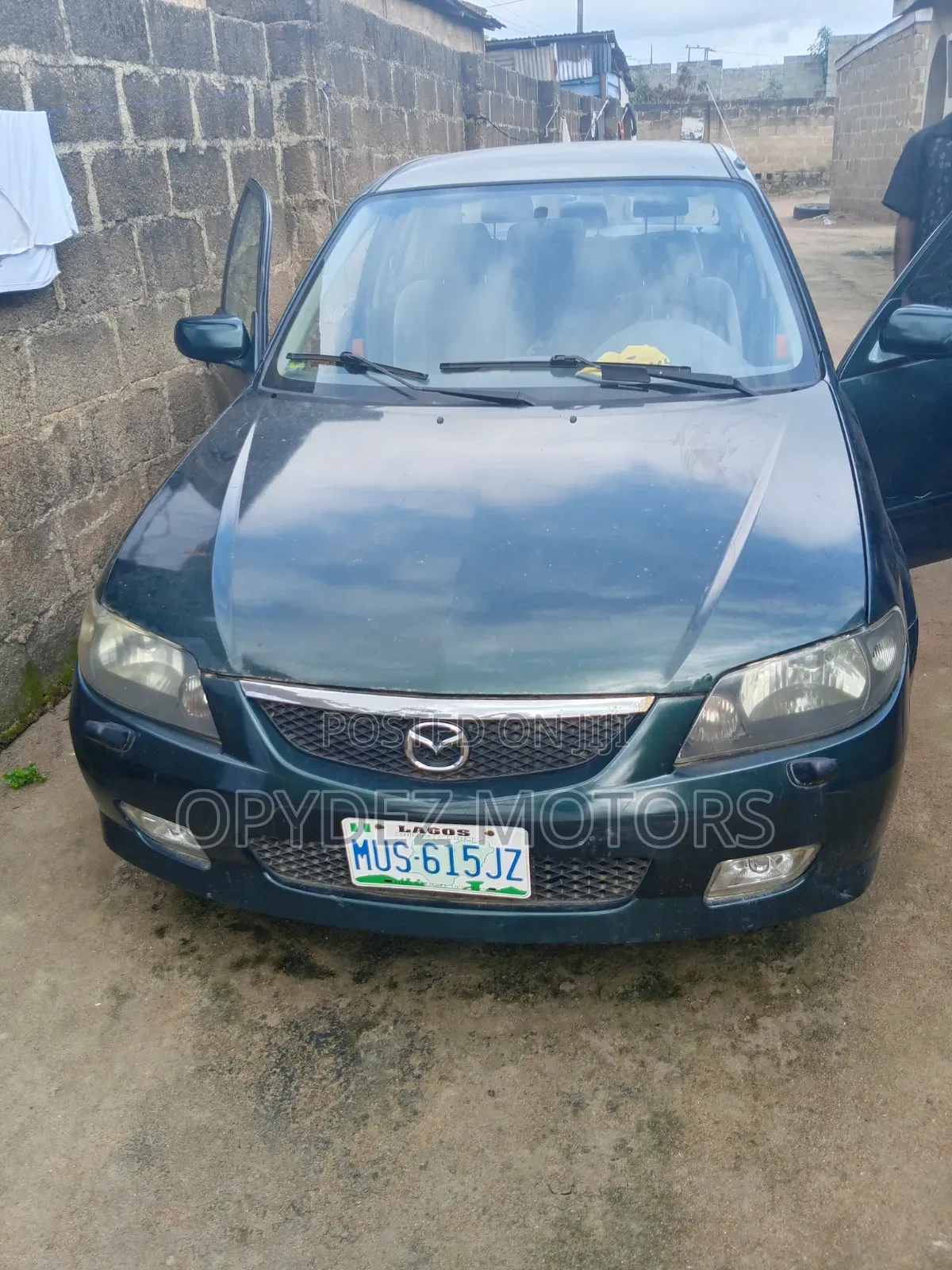 Mazda 323 2004 Green
