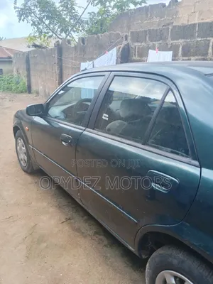 Mazda 323 2004 Green