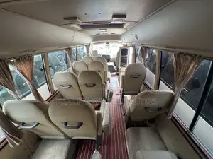 Toyota Coaster 2022 Brown