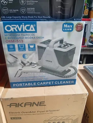 ORVICA Portable Carpet Cleaner (Model: ORM-513).