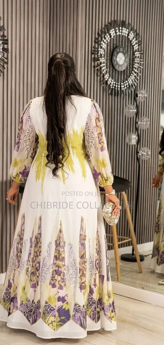 Elegant White & Gold Patterned Maxi Dress