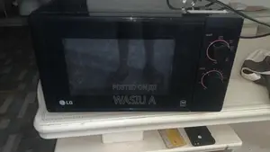 Used LG Microwave Double Settings