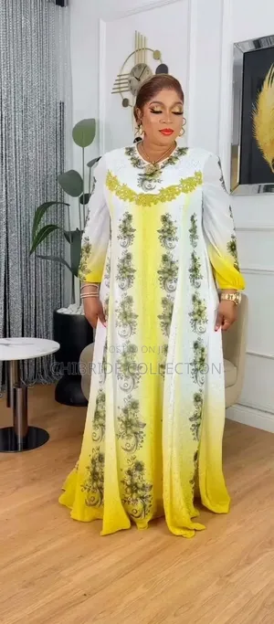 Elegant White & Yellow Printed Maxi Dress