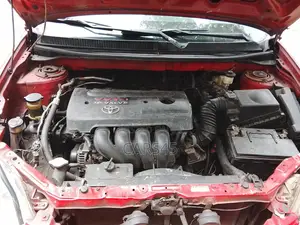 Toyota Matrix Hatchback AWD (1.8L 4cyl 4A) 2006 Red