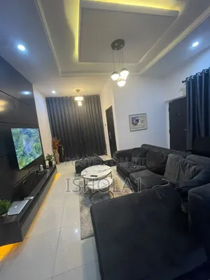 Barely Used L Shaped Sofa With 4 Pillows