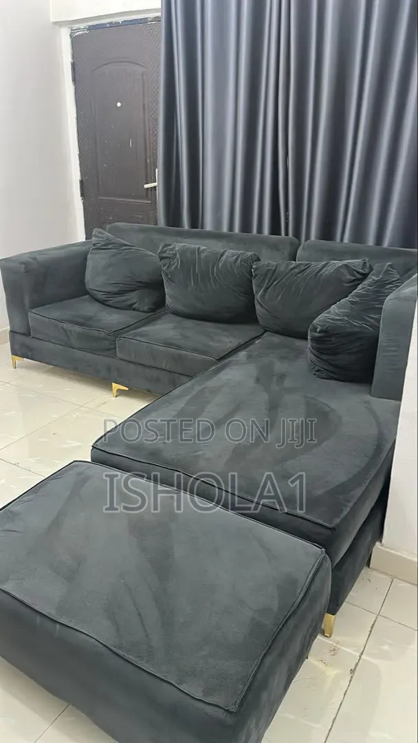 Barely Used L Shaped Sofa With 4 Pillows