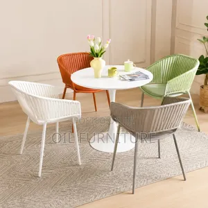 ​Modern 4-Seater Dining Set – White Round Pedestal Table