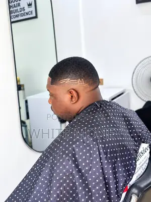 White Pearl Cuts Precessional Barber in Kwale- Fades, Dreads Retwist.