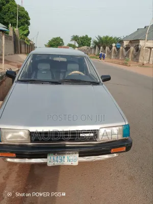 Mazda 323 1998 Brown
