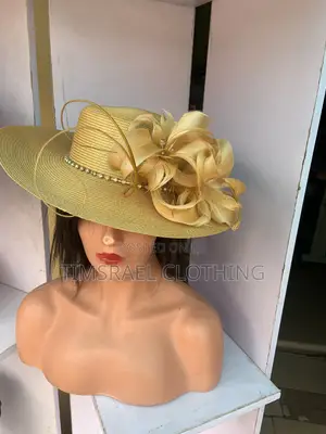 Gold Hat With Feather Decoration