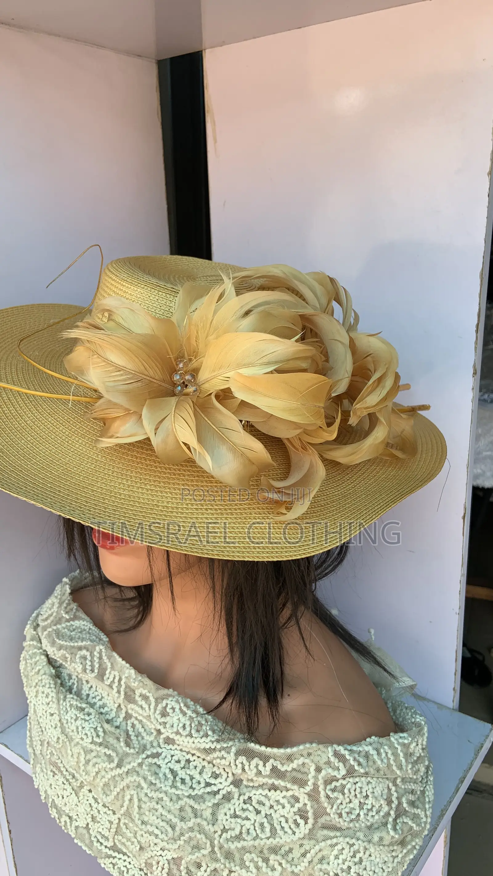 Gold Hat With Feather Decoration