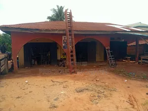 Sharp 50ft × 150ft Commercial Land With Building for Sale