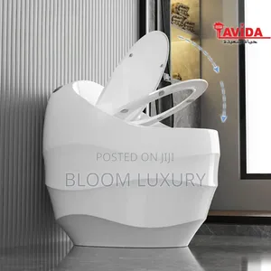 Modern Rounded Toilet With Layered Cylindrical Sleek Design.