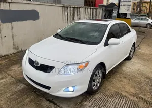 Toyota Corolla XLE 4dr Sedan (1.8L 4cyl 4A) 2010 White