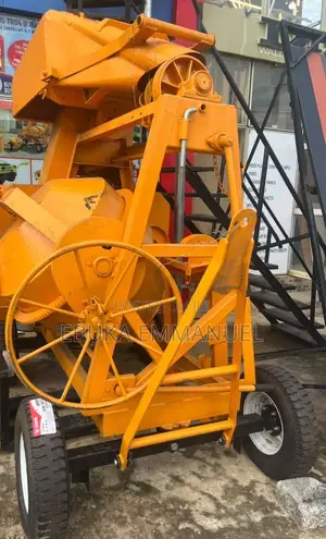 Concrete Mixer With Lifting Hoper
