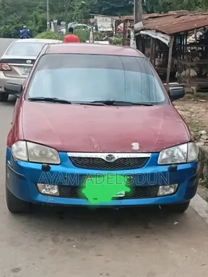 Mazda 323 2000 Red