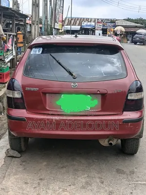Mazda 323 2000 Red
