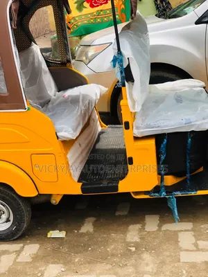 New Bajaj RE 2026 Yellow