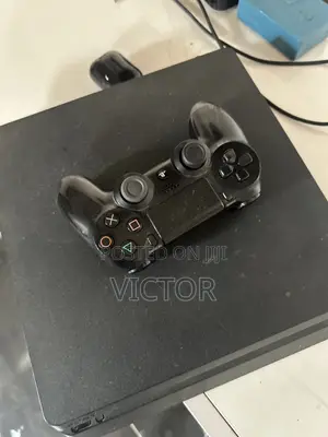 PS4 Slim With 7games Fc26 Included and One Pad