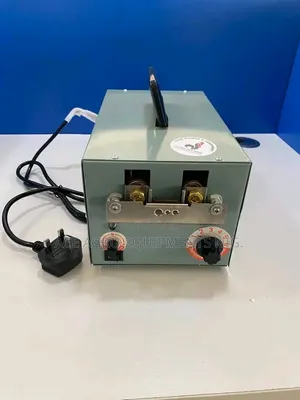 Debeaker Machine