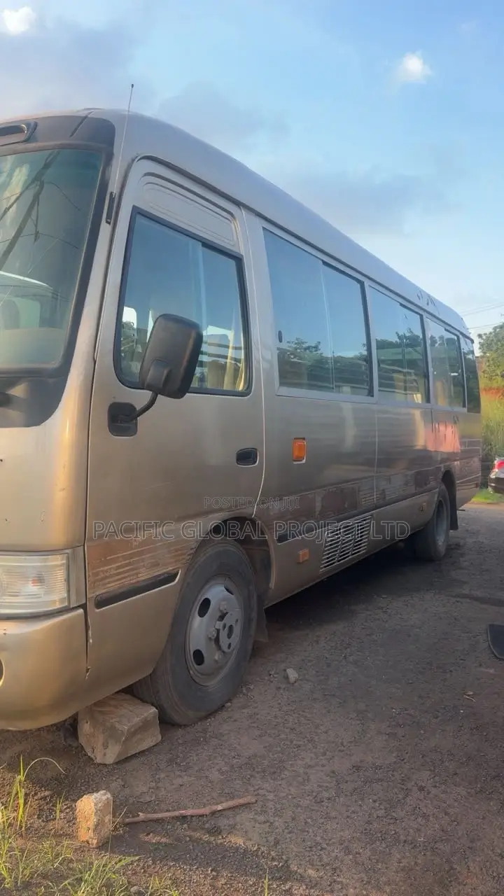 Toyota Coaster 2017 Gold