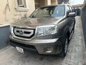 Honda Pilot EX-L 4dr SUV (3.5L 6cyl 5A) 2010 Gold