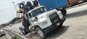 American Used UD Mack Mounted Grapple Tractor