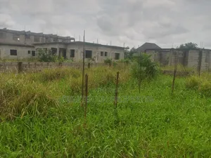 Commercial Half Plot of Land a Uncompleted Building