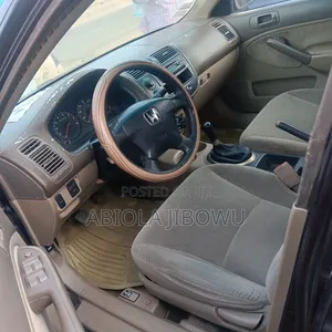 Honda Civic LX 2dr Coupe (1.7L 4cyl 4A) 2001 Brown