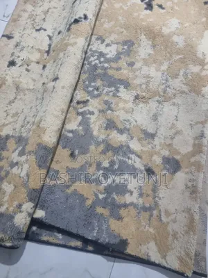 Neatly Used Original Turkish Abstract Center Rug (7ft X 10ft)