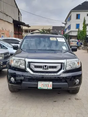 Honda Pilot Touring w/RES/Navi 4WD (3.5L 6cyl 5A) 2011 Black
