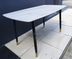 Rectangular Dining Table Featuring a White Faux-Marble
