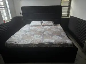 Used 6 by 6 Semi-Orthopaedic Bed and Bed Stand