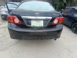Toyota Corolla Base 4dr Sedan (1.8L 4cyl 5M) 2009 Black