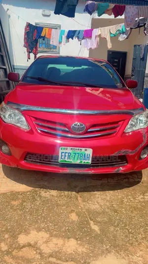 Toyota Corolla Base 4dr Sedan (1.8L 4cyl 5M) 2010 Red