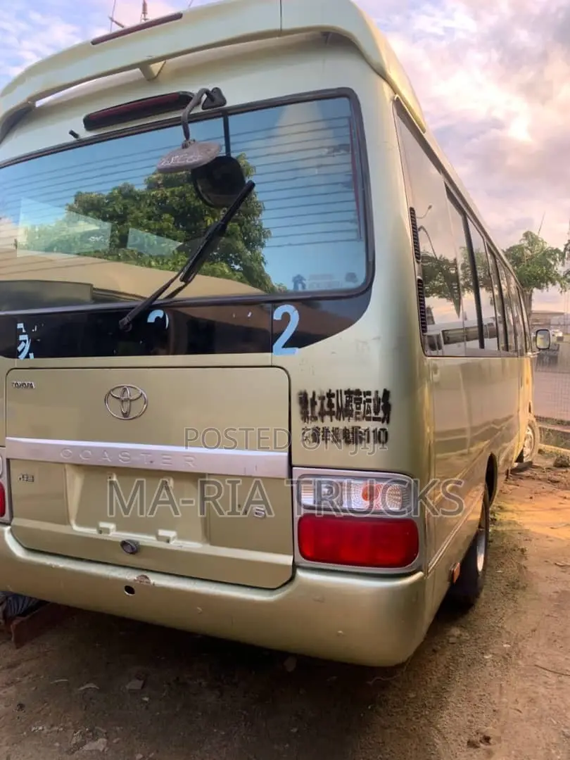 Toyota Coaster 2017 Gold