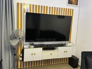 Functioning High Gloss TV Consule for Sale. Fits Up to 75inch Above