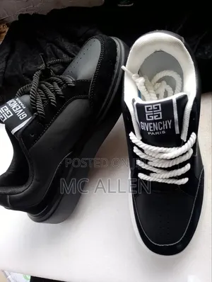 Givenchy Sneakers (Available in White and Black Soles).