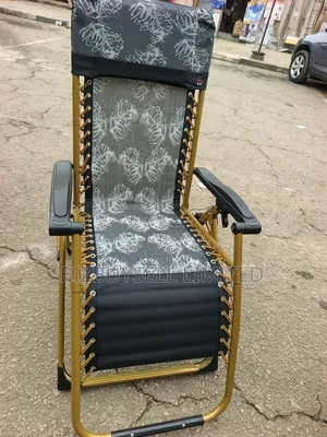 Foldable Outdoor Zero-Gravity Reclining Lounge Chair With a Gold-Toned