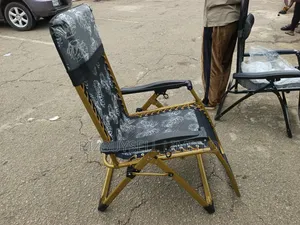 Foldable Outdoor Zero-Gravity Reclining Lounge Chair With a Gold-Toned