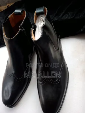 Black Aldo Wingtip Dress Ankle Boot