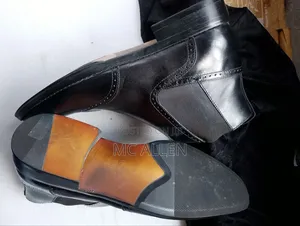 Black Aldo Wingtip Dress Ankle Boot