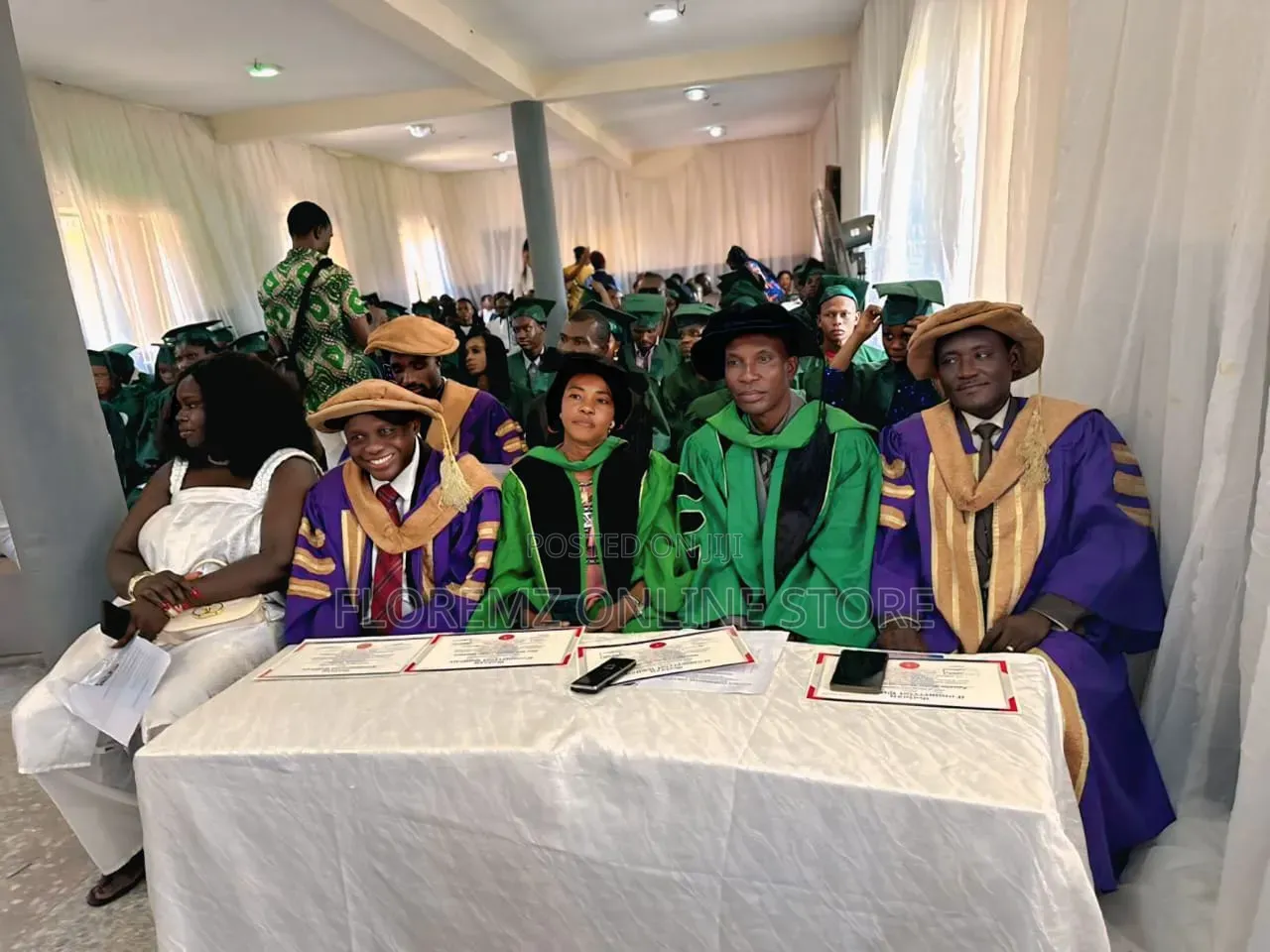 Green Doctoral Gowns Available for Rental